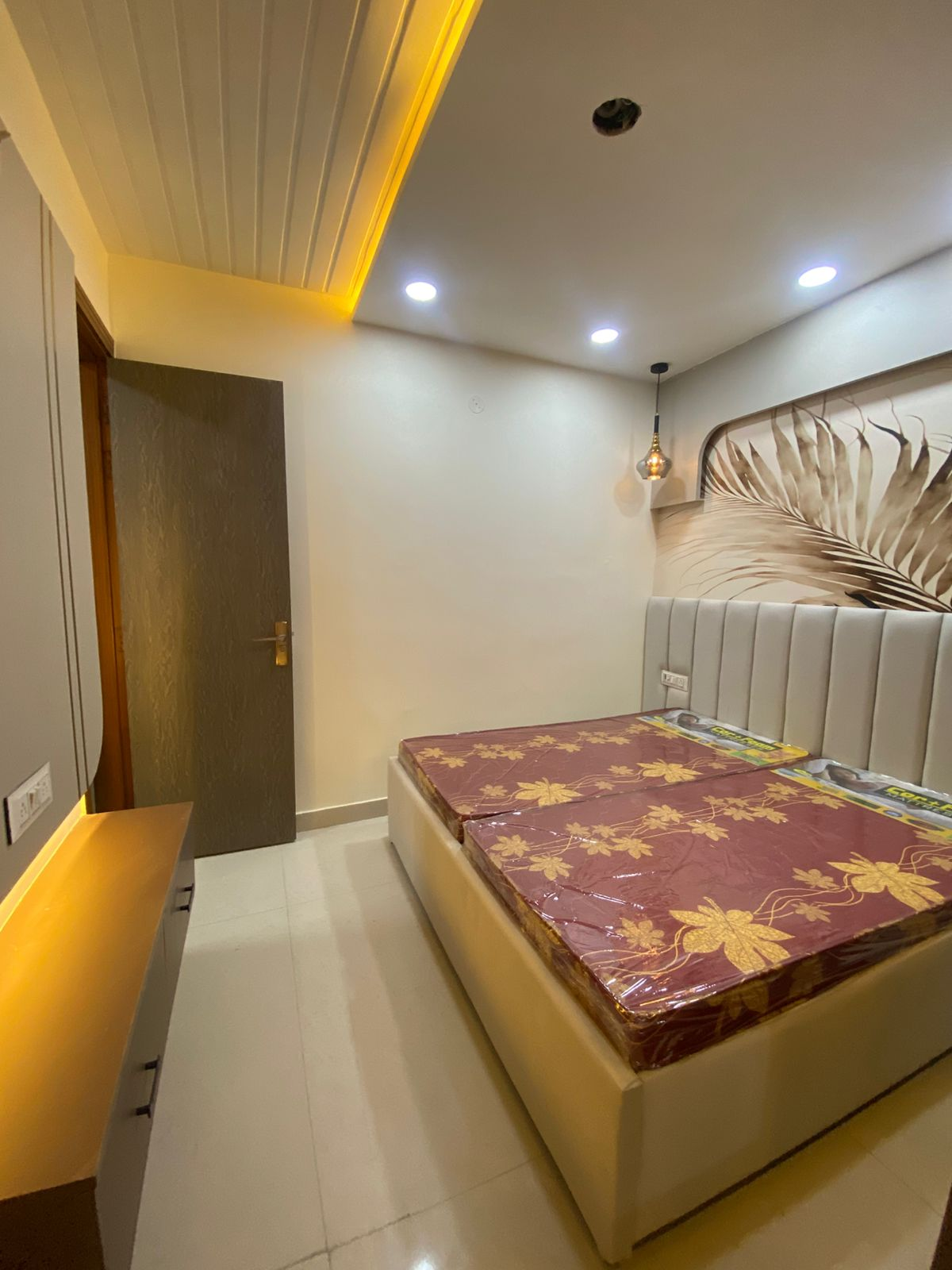 Bedroom, 3 BHK interior, modern bed, lighting, stylish decor